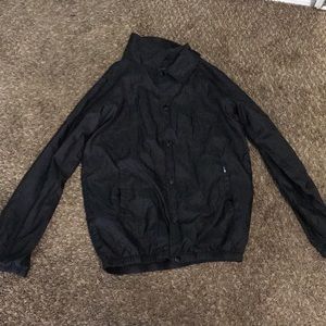 black windbreaker